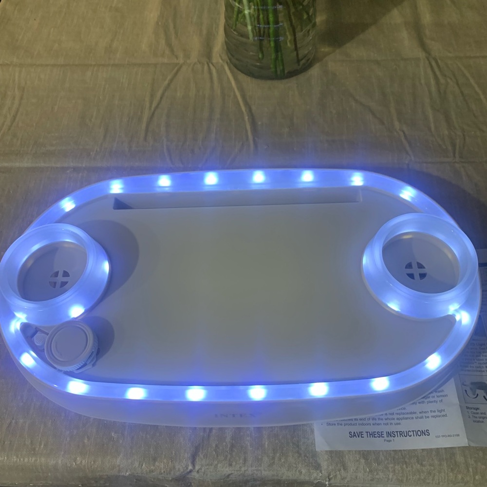 Spa tray with two cupholders, lights and tablet holder with foldable legs.